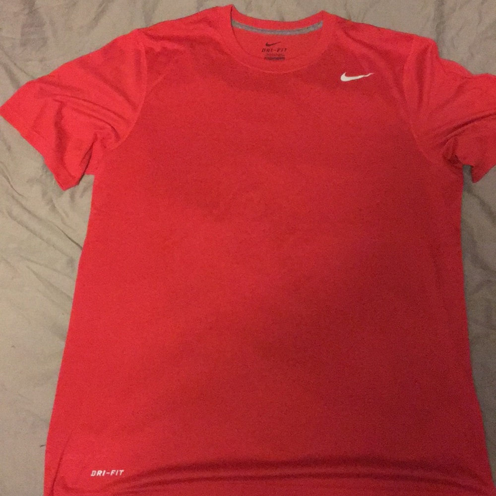 Red Nike athletic shirt